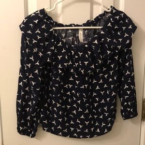 Hand wash cold. Off the shoulders top. Worn. Elastic wrist